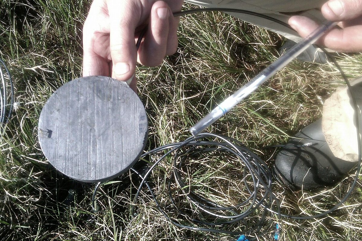 Graphite electrodes being handled outdoors